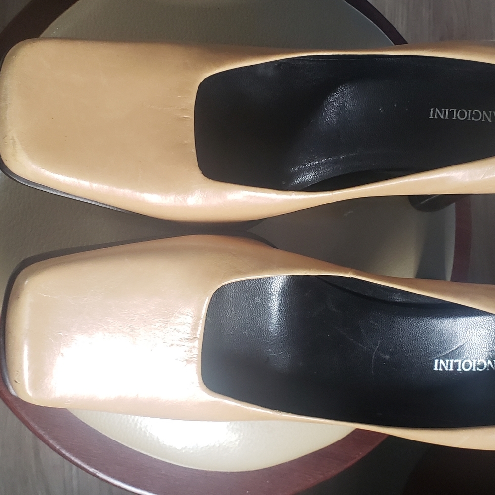 Tan Enzo Angiolini 3 inch heels, worn once with slight discoloration in front.